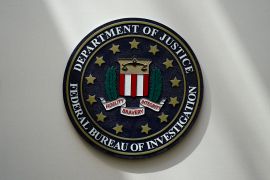 An FBI seal is seen on a wall on August 10, 2022, in Omaha, Nebraska, USA [File: Charlie Neibergall/AP Photo]