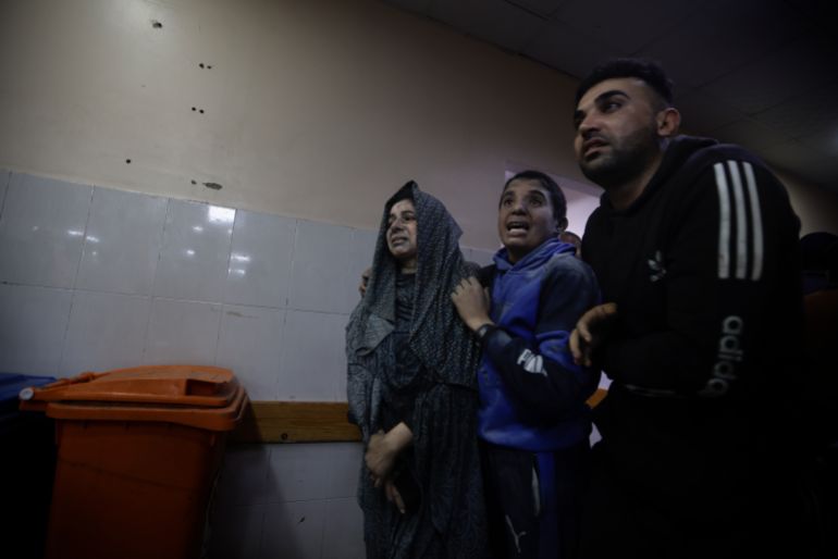 Palestinians wounded in the Israeli bombardment of the Gaza Strip arrive at a hospital in Khan Younis