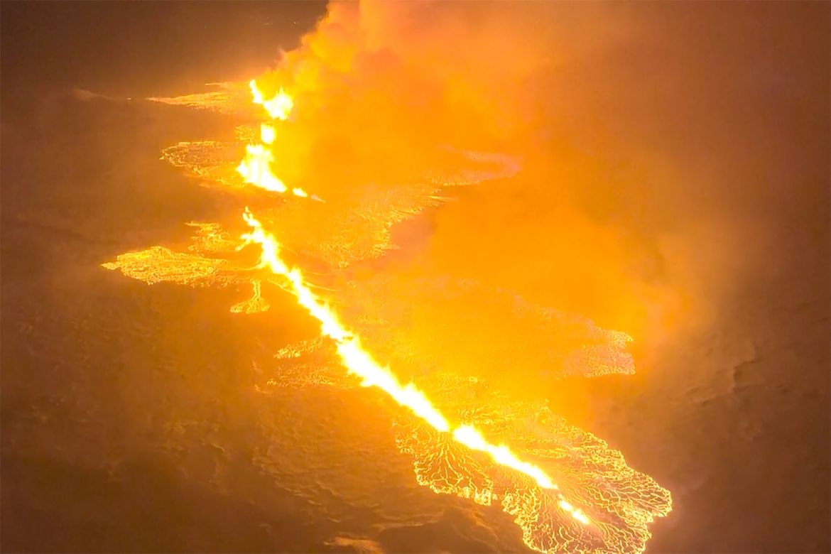 A volcano spews lava and smoke as it erupts in Grindavik, Iceland