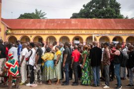 Voters queue outside a polling station during the presidential elections in Kinshasa, Democratic Republic of Congo, Wednesday, Dec. 20, 2023. [AP Photo/Mosa&#039;ab Elshamy]