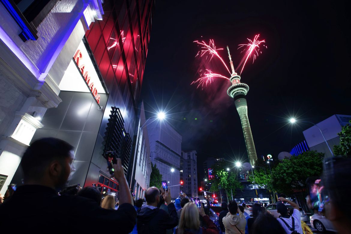 Fireworks burst from the Sky Tower in Auckland, New Zealand, to celebrate the New Year on Monday.