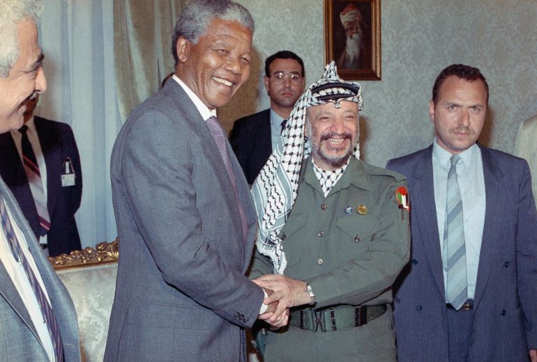 South African anti-apartheid leader Nelson Mandela meets with Palestinian Liberation Organization Chairman Yasser Arafat, right, on Sunday, May 20, 1990 in Cairo. Both are in Cairo to meet with Egyptian President Hosni Mubarak. (AP Photo/Axel Schulz-Eppers)