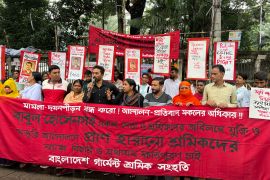 Activists protesting the arrest of workers in recent wage hike protest