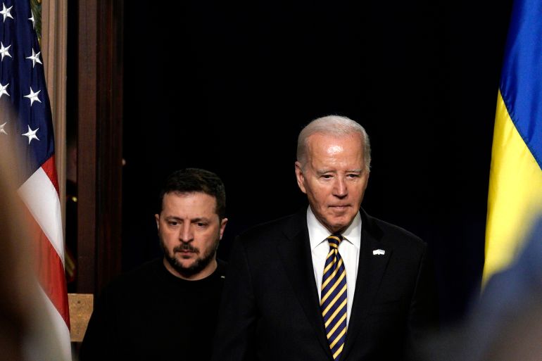 US President Joe Biden, right, and Volodymyr Zelenskiy, Ukraine's president, arrive during a news conference in the Indian Treaty Room on the White House complex,
