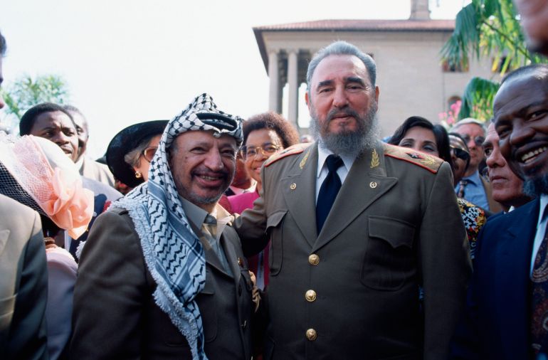 Arafat and Castro at Mandela's inauguration 1993