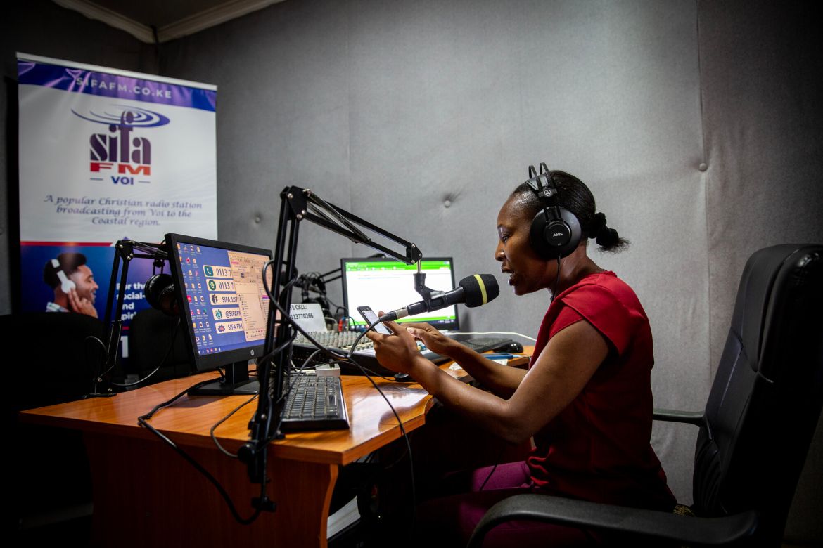 Journalist, Linda Akoth, presents the daily weather at her morning show at Sifa radio station in the town of Voi, Taita Taveta. She receives the forecasts directly on her phone from the Kenya Meteorological Department. Linda produces daily weather reports and news stories that explore the wider impact of the forecasts. She also interviews government officials, aid organisations and farmers to hear how the weather affects them.