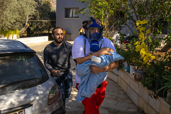 A Red Crescent member carried a child through Israeli tear gas and hurriedly took him to the hospital. In the city of Beta, south of Nablus in the West Bank, clashes occurred between Israeli troops and Palestinian youths after Israeli forces conducted a raid.