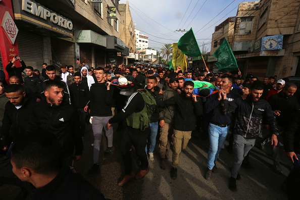People attend the funeral of 16-year-old Abdulrahman Imad Khaled Bin Awadeh and 23-year-old Muaz Ibrahim Zahran killed in Israeli raid and attack on Tubas city in Nablus, West Bank on December 06.