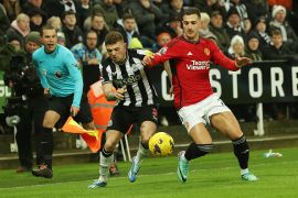 Kieran Trippier of Newcastle United vies with Diogo Dalot of Manchester United [MB Media/Getty Images]
