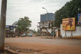 An empty street in Bissau on Friday, following clashes between two army factions [Samba Balde/AFP]
