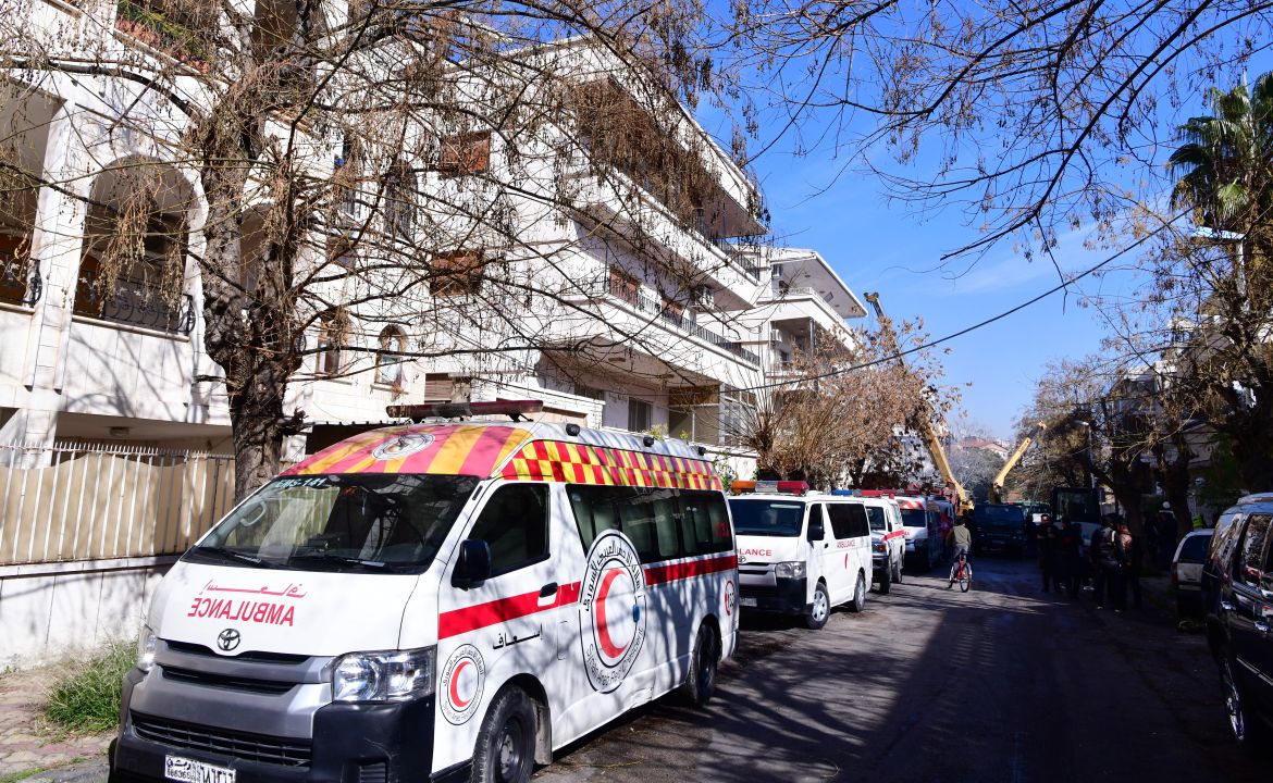 Ambulances are seen at the site of residential building that was targeted in an alleged Israeli strike in Mezzah neighborhood, Damascus, Syria, 20 January