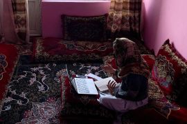 Sofia, an Afghan student, speaks English during an online class, at her house in Kabul, Afghanistan, March 18, 2023. REUTERS/Sayed Hassib