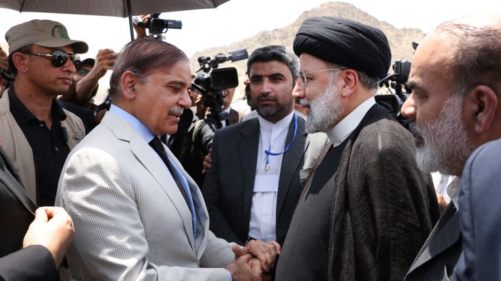 Iranian President Ebrahim Raisi meets Pakistan's then-Prime Minister Shehbaz Sharif in May 2023