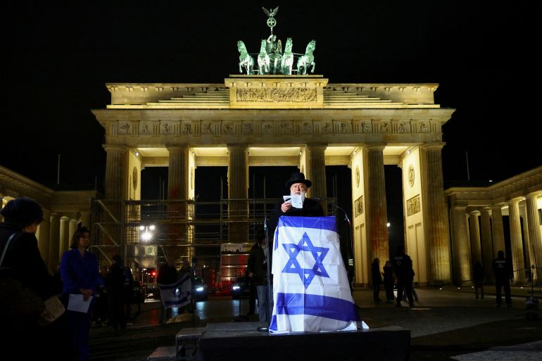 Rabbi Y. Ehrenberg takes part in an event to commemorate the victims of October 7 Hamas' attack in front of Brandenburg gate, amid the ongoing conflict between Israel and the Palestinian group Hamas, in Berlin, Germany, November 7, 2023