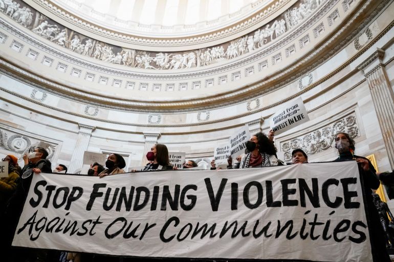 Protesters call for a ceasefire and an end to U.S. military funding in the ongoing conflict between Israel and the Palestinian Islamist group Hamas, as they demonstrate inside the Rotunda of the U.S. Capitol in Washington, U.S., December 19, 2023. REUTERS/Elizabeth Frantz