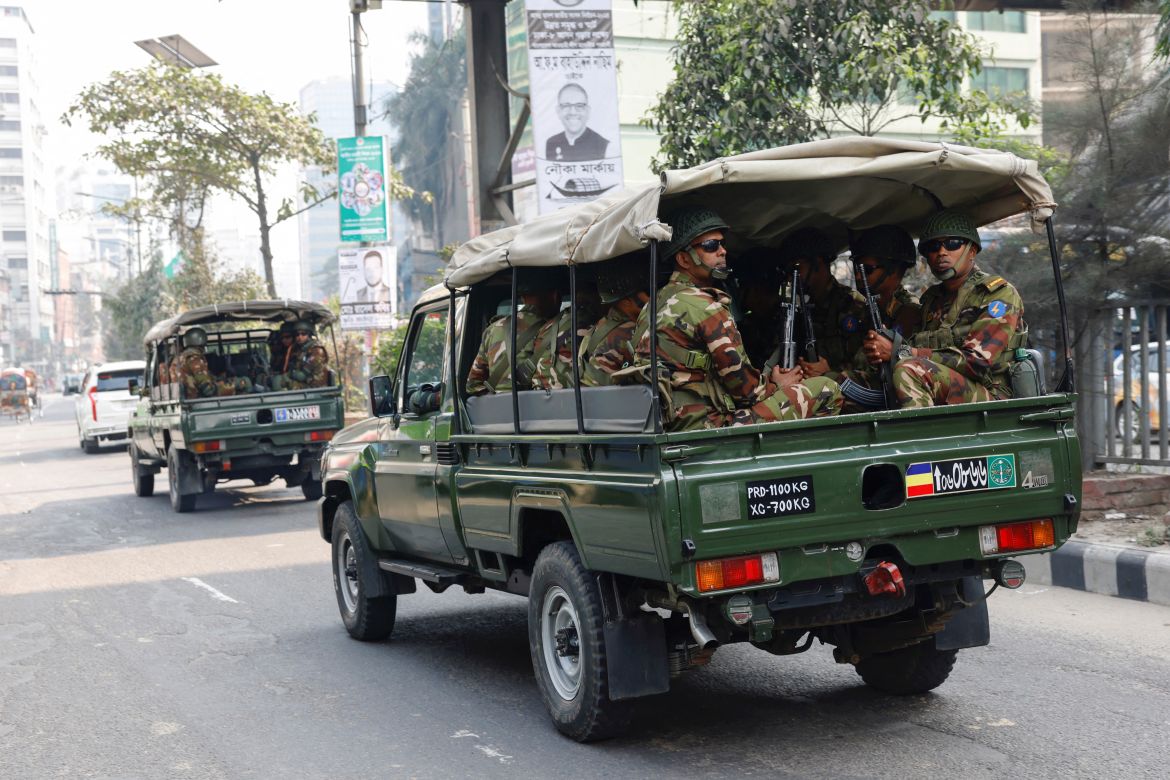 Members of Bangladesh Army patrol on the road, as they are deployed to assist civil administration, a day ahead of the general election in Dhaka, Bangladesh, January 6, 2024.