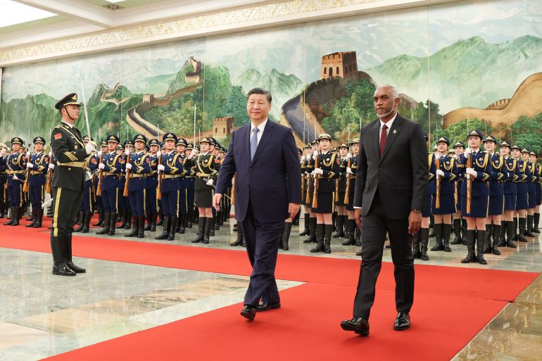 Chinese President Xi Jinping and Maldivian President Mohamed Muizzu attend a welcome ceremony at the Great Hall of the People in Beijing, China January 10, 2024