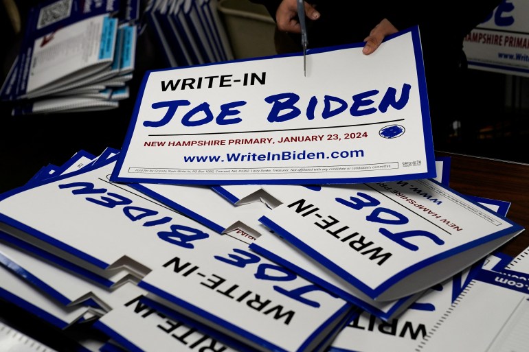Sinais promovendo uma campanha escrita para colocar Joe Biden nas eleições primárias de New Hampshire