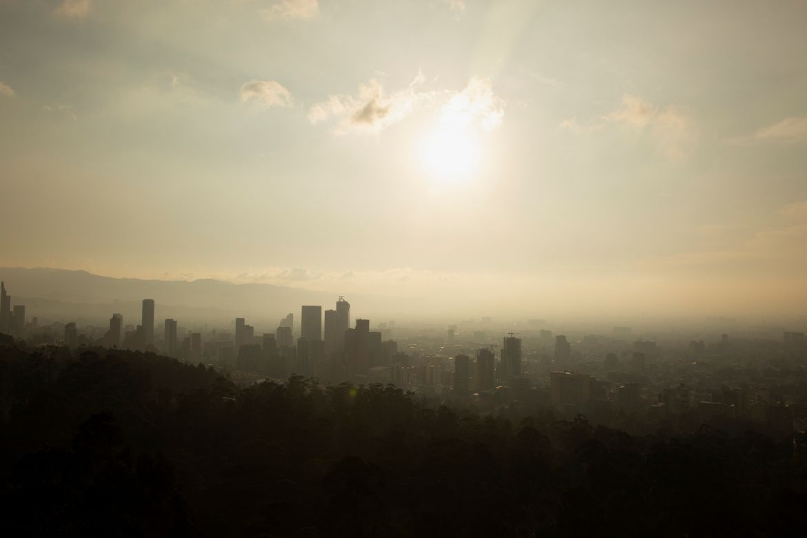 General view of the city as forest fires burn on a hill, after the district government declared an air quality emergency, in Bogota, Colombia, January 26