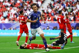 Japan's Ayase Ueda celebrates after scoring