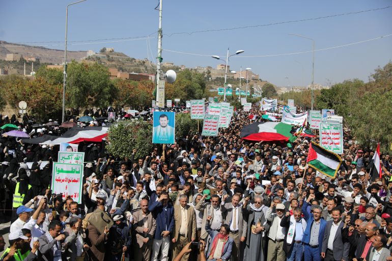 University students and professors rally to show support for the Palestinians in the Gaza Strip and the recent Houthi strikes on ships in the Red Sea and the Gulf of Aden, in Sanaa