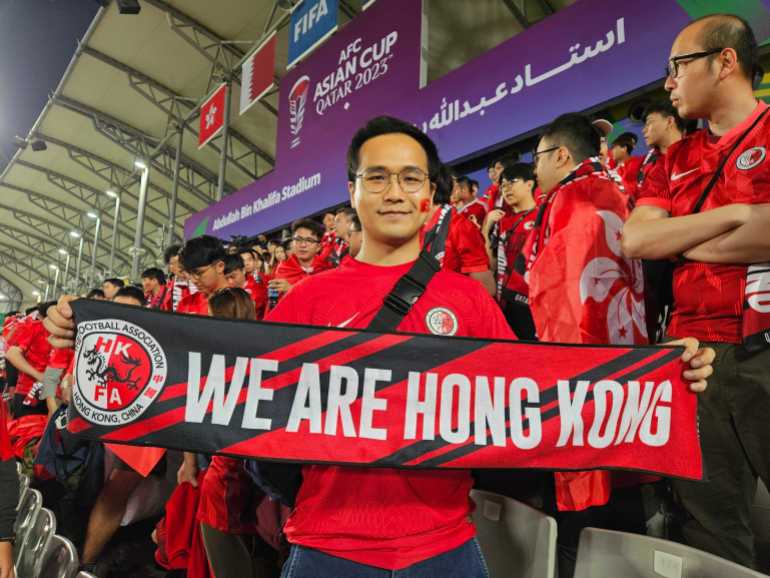 Hong Kong fan Eddie Wu at the Abdullah bin Khalifa Stadium, Doha, Qatar [Hafsa Adil/Al Jazeera]