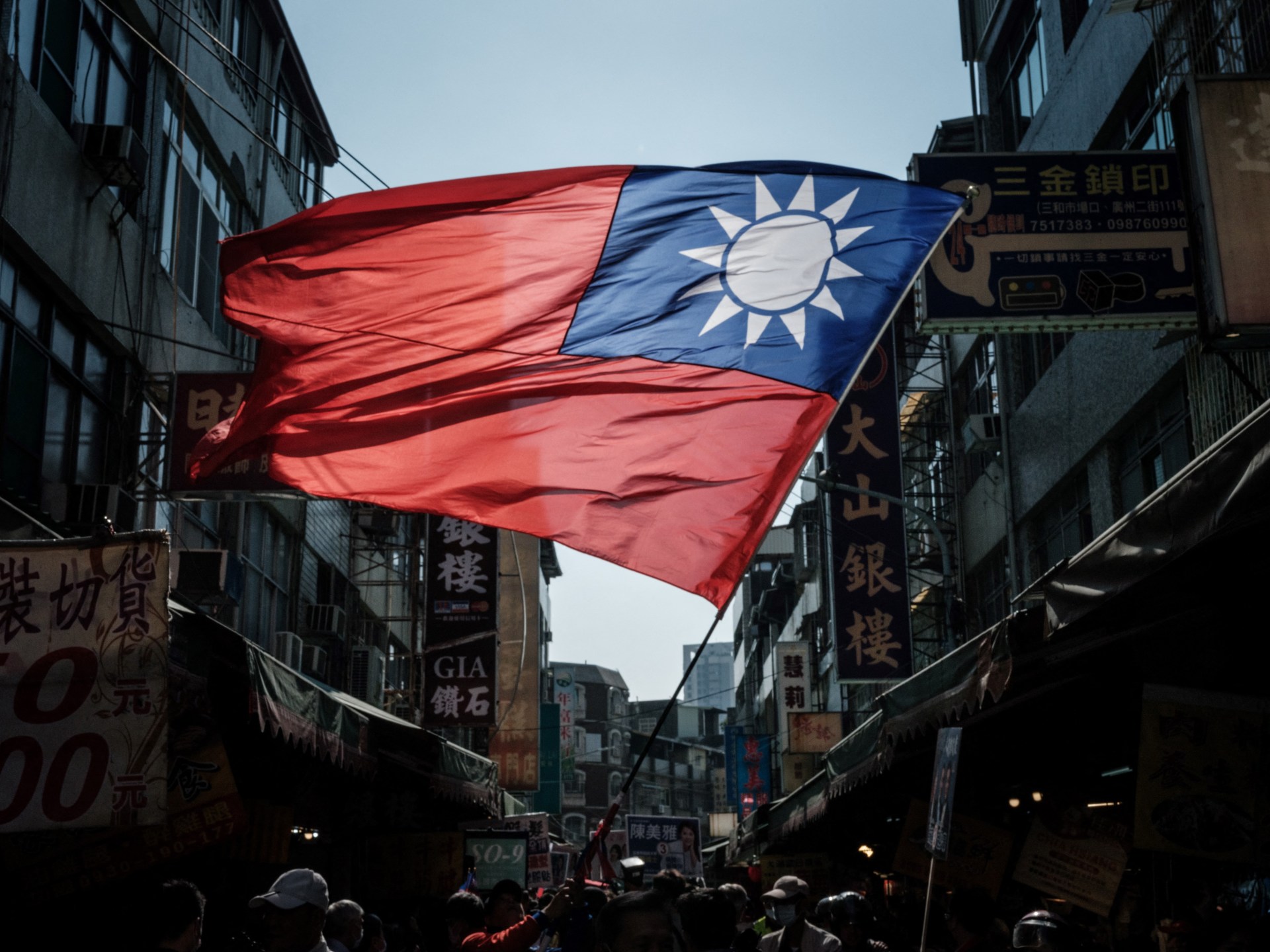 ‘A country but not a country’: Taiwan prepares to vote in China’s shadow