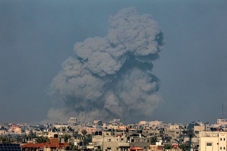 A picture taken from Rafah shows smoke billowing over Khan Yunis in the southern Gaza Strip during Israeli bombardment on January 19, 2024. [AFP]