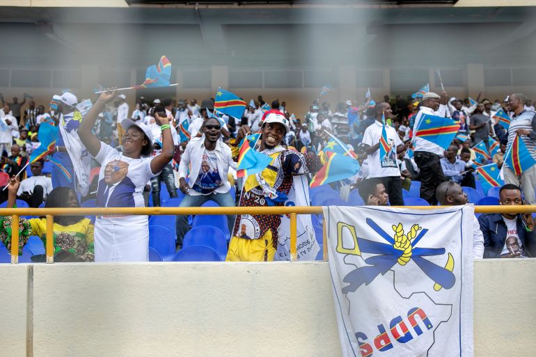 Supporters of the President of the Democratic Republic of Congo, Felix Tshisekedi, gather ahead of his inauguration at Stade de Martyrs in Kinshasa on January 20, 2024. (Photo by Arsene MPIANA MONKWE / AFP)