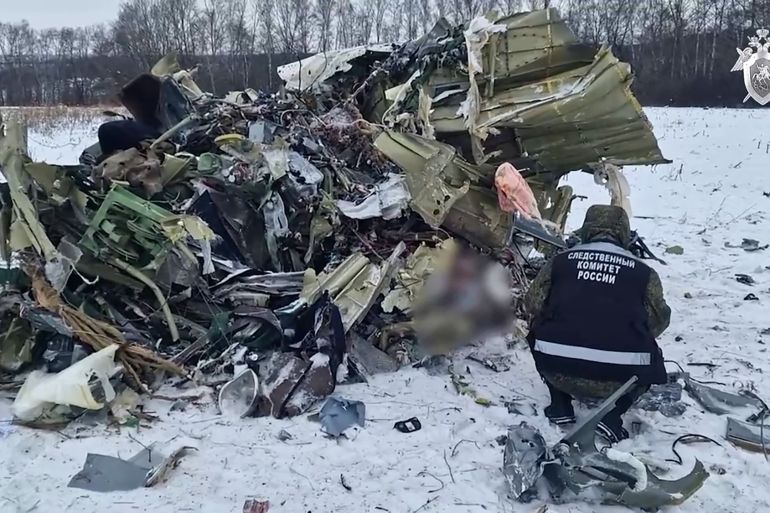 This grab taken from a handout footage released by the Russian Investigative Committee on January 25, 2024 shows what investigators say is the Russian IL-76 military transport plane crash site in the Belgorod region. - Russia on January 25, 2024 opened a "terrorism" investigation over a military plane crash near the border with Ukraine after it accused Kyiv of downing the aircraft, which it said had 65 captured Ukrainian soldiers onboard. (Photo by Handout / RUSSIAN INVESTIGATIVE COMMITTEE / AFP) / RESTRICTED TO EDITORIAL USE - MANDATORY CREDIT "AFP PHOTO / RUSSIAN INVESTIGATIVE COMMITTEE" - NO MARKETING NO ADVERTISING CAMPAIGNS - DISTRIBUTED AS A SERVICE TO CLIENTS - RESTRICTED TO EDITORIAL USE - MANDATORY CREDIT "AFP PHOTO / Russian Investigative Committee" - NO MARKETING NO ADVERTISING CAMPAIGNS - DISTRIBUTED AS A SERVICE TO CLIENTS /