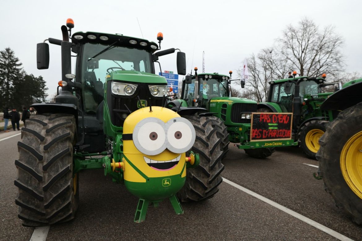 This photograph shows a tractor displaying a 'Minion' during a protest called by local branches of major farmer unions
