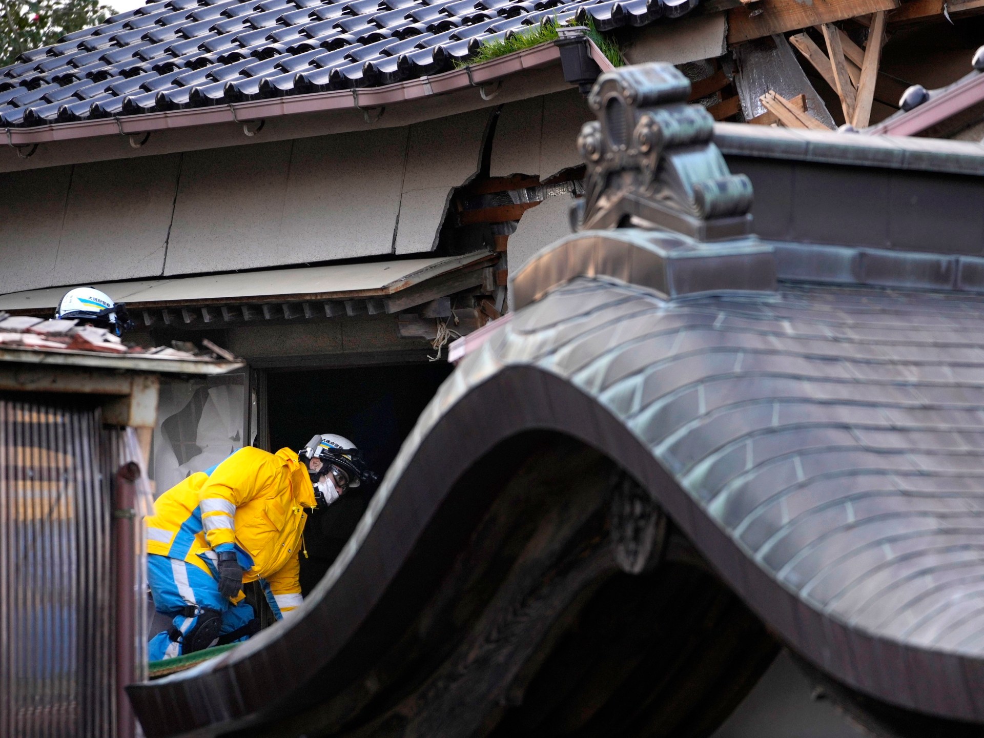 Woman in her 90s pulled alive from rubble of Japan earthquake | Earthquakes News