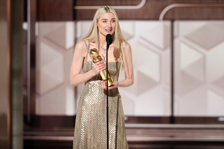 Elizabeth Debicki accepting the award for best performance by a female actor in a supporting role on television for her role in "The Crown" during the 81st Annual Golden Globe Awards 