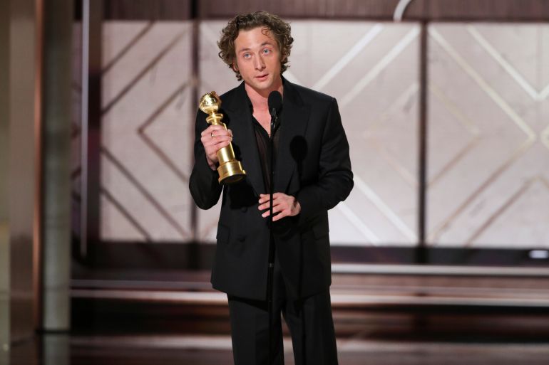 Jeremy Allen White accepting the award for best performance by a male actor in a television series for his role in "The Bear" during the 81st Annual Golden Globe Awards 