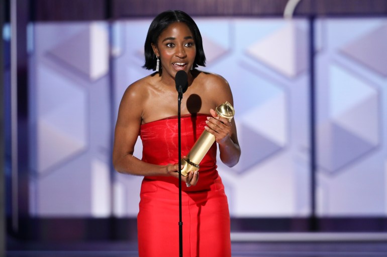 Ayo Edebiri accepting the award for best performance by a female actor in a TV series for her role in "The Bear" during the 81st Annual Golden Globe Awards 