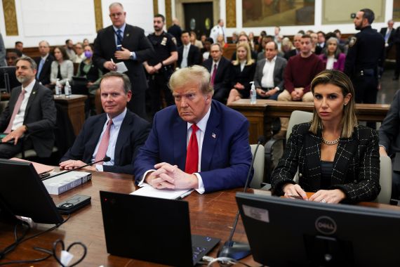 Former US President Donald Trump, with his lawyers, attends the closing arguments in the Trump Organization civil fraud trial at New York State Supreme Court