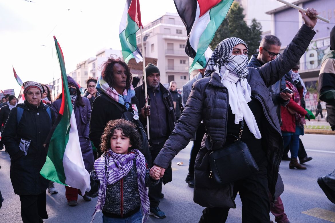 Protesters take part in a rally in support of Palestinians, in Athens, Greece, Saturday