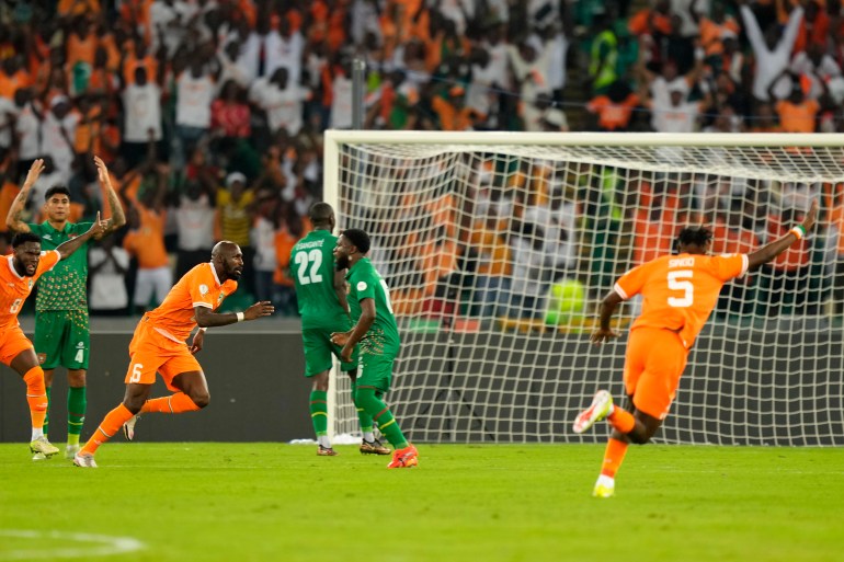 Ivory Coast's Seko Fofana celebrates after scoring the first goal for his team during the African Cup of Nations Group A soccer match between Ivory Coast and Guinea-Bissau in Abidjan, Ivory Coast, Saturday, Jan. 13, 2024. (AP Photo/Sunday Alamba)