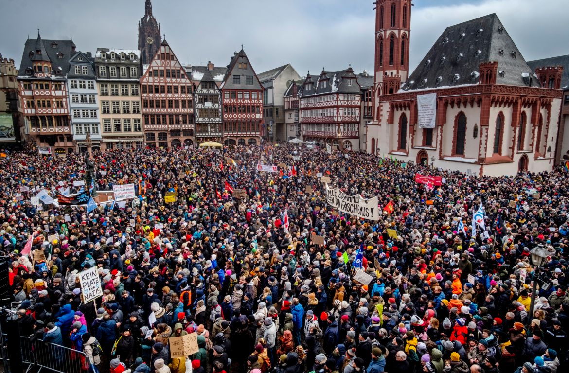 People gather as they protest against the AfD party and right-wing extremism in Frankfurt/Main, Germany, Saturday, Jan. 20