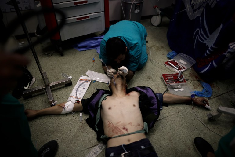 A Palestinian wounded in the Israeli bombardment of the Gaza Strip receives treatment at the Nasser hospital in Khan Younis, Southern Gaza Strip