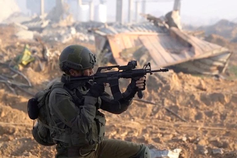 An Israeli soldier operates at a location given as the Gaza Strip amid the ongoing conflict between Israel and the Palestinian Islamist group Hamas, in this screen grab obtained from a video released on January 8, 2024. Israel Defense Forces/Handout via REUTERS THIS IMAGE HAS BEEN SUPPLIED BY A THIRD PARTY