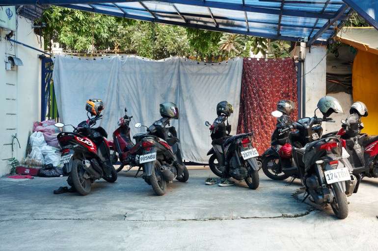 Motorbikes parked outside the Khalsa Diwan Sikh Temple Manila (Sonny Thakur/Al Jazeera)