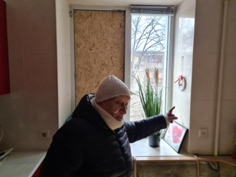 Tamara Karnaukhova stands in her kitchen damaged by Russian shelling-1706525486