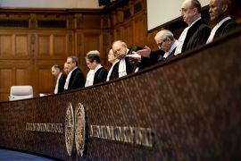 Judge Nawaf Salam (centre) presides over a hearing at the International Court of Justice (ICJ) on the legal consequences of the Israeli occupation of Palestinian territories, The Hague, the Netherlands [Robin van Lonkhuijsen/EPA]