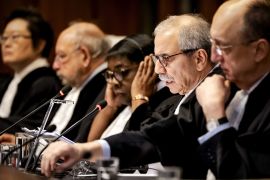 Nawaf Salam (2-R), President of the Court, presides over a hearing at the International Court of Justice (ICJ) in The Hague, the Netherlands [Robin van Lonkhuijsen/EPA]