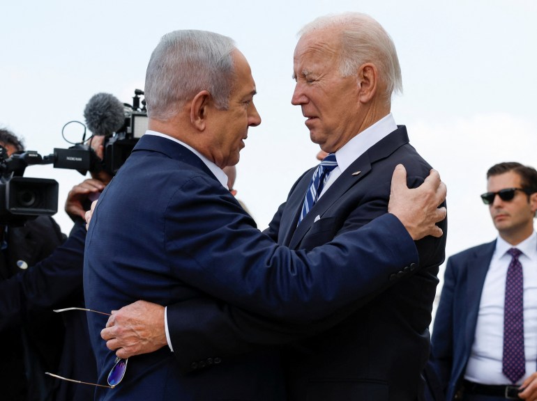 U.S. President Joe Biden is welcomed by Israeli Prime Minster Benjamin Netanyahu, as he visits Israel amid the ongoing conflict between Israel and Hamas, in Tel Aviv, Israel, October 18, 2023. REUTERS/Evelyn Hockstein