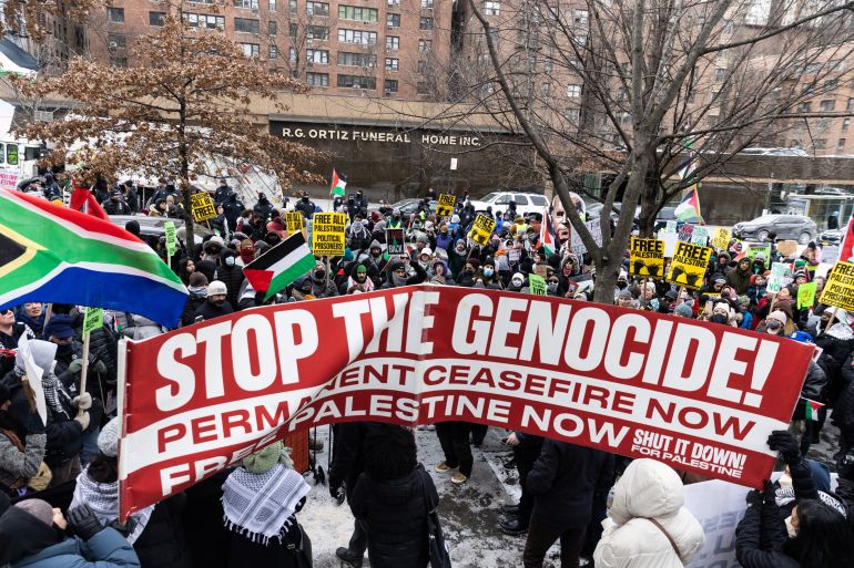 Pro-Palestinian demonstrators protest as they take part in the "Biden: stop supporting genocide!" rally in New York City, U.S., January 20, 2024. REUTERS/Jeenah Moon