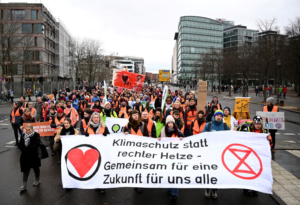 People attend a demonstration march to protest against right-wing extremism and for the protection of democracy in Berlin, Germany February 3