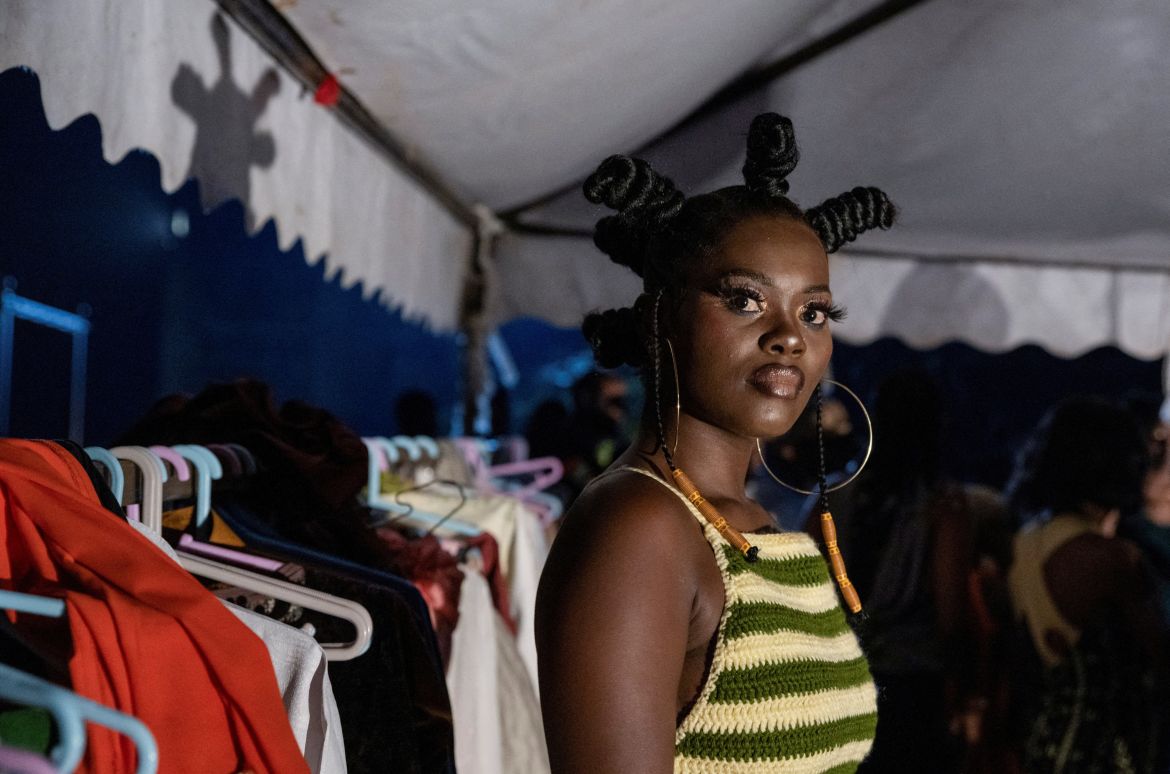 A model poses in the backstage during the One Fashion Week aimed to combat discrimination, in Goma, North Kivu province of the Democratic Republic of Congo February