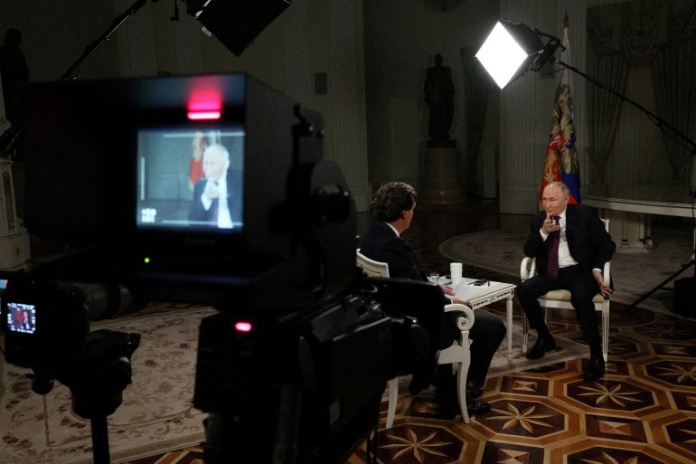 Russian President Vladimir Putin speaks during an interview with U.S. television host Tucker Carlson